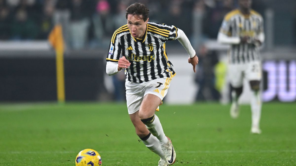 Federico Chiesa competing on the wing in an attacking duel for Juventus during a match