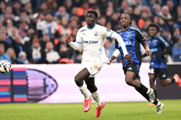 Robinio Vaz in Marseille kit focused on the ball during a match, showing agility and concentration