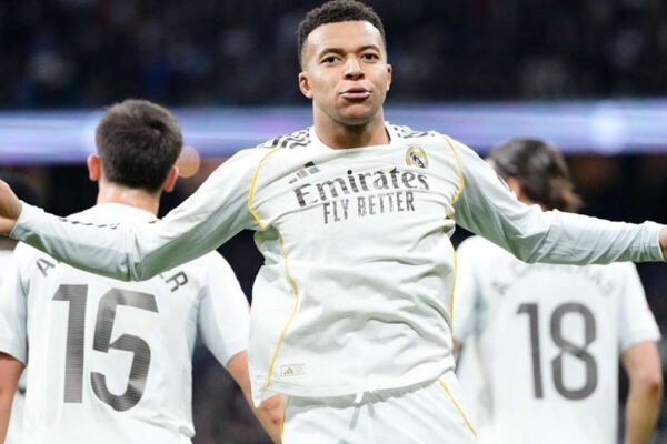 Mbappé celebrates a goal in Real Madrid kit at Bernabéu