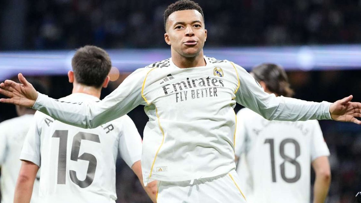 Mbappé celebrates a goal in Real Madrid kit at Bernabéu