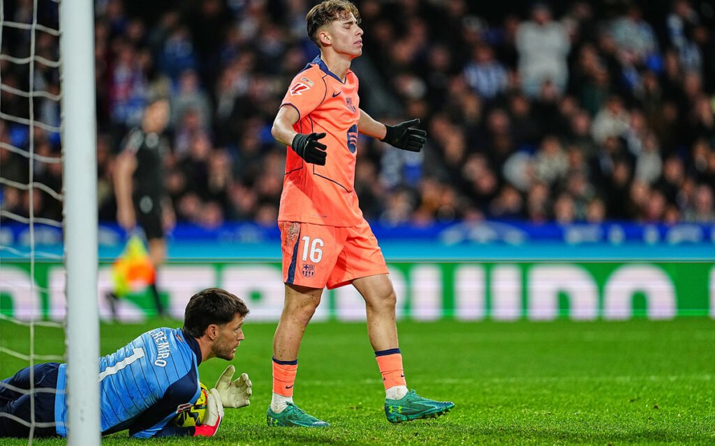 Alejandro Remiro stretches to save a close-range Barcelona effort in the box