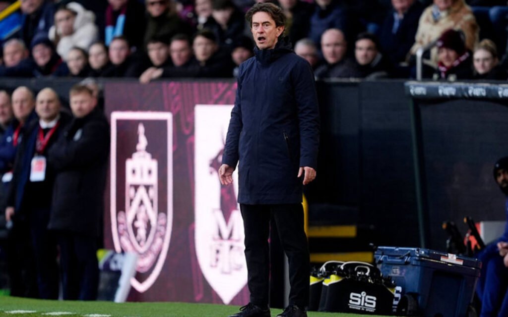 Thomas Frank stands on the touchline during a Tottenham match