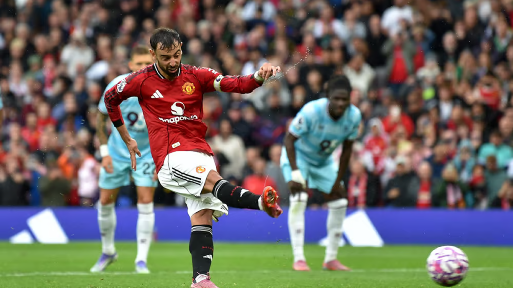 Bruno Fernandes striking a penalty for Manchester United in action