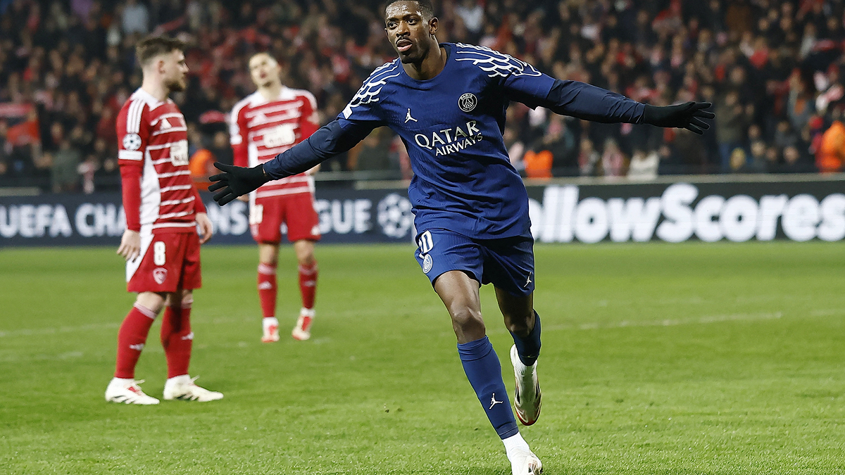 Ousmane Dembélé celebrating a goal during a PSG match, full of energy and excitement