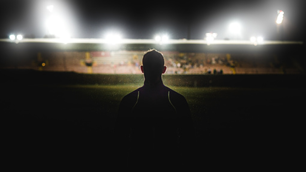 Silhouette of a football player, illustrating transfer market uncertainty
