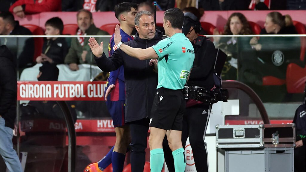 Barcelona coach Hansi Flick discussion with referee