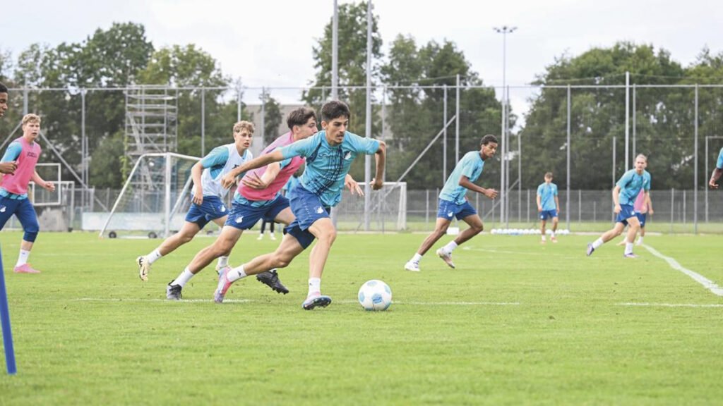 Hoffenheim reserve team trains on pitch with cones and bibs