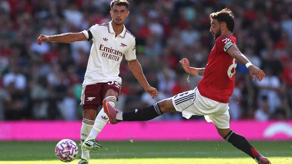 Zubimendi controls the ball under pressure in midfield