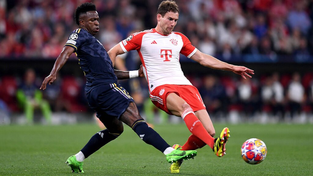Midfield duel as Goretzka challenges for the ball