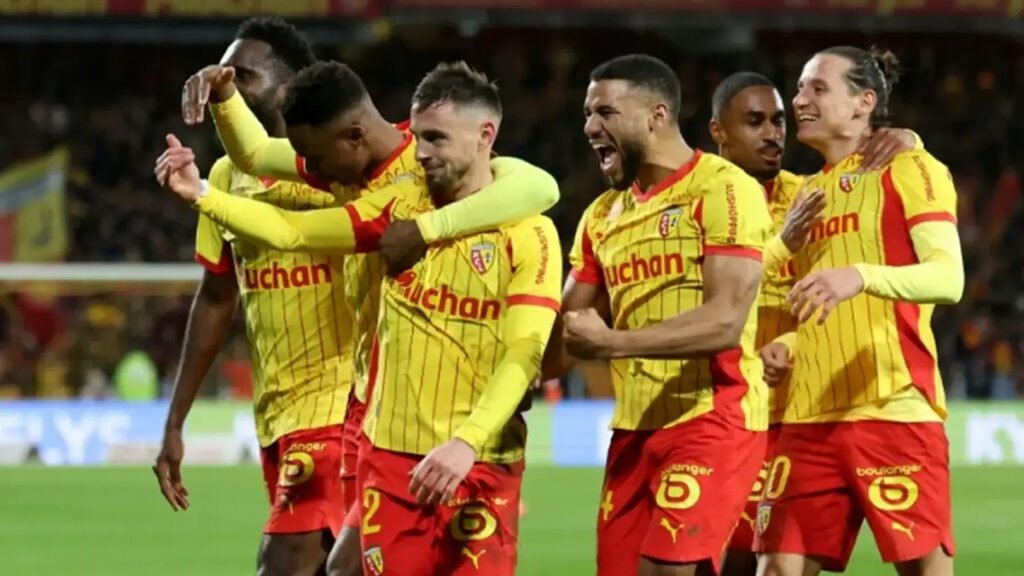 Ruben Aguilar celebrates after putting Lens ahead against Rennes.